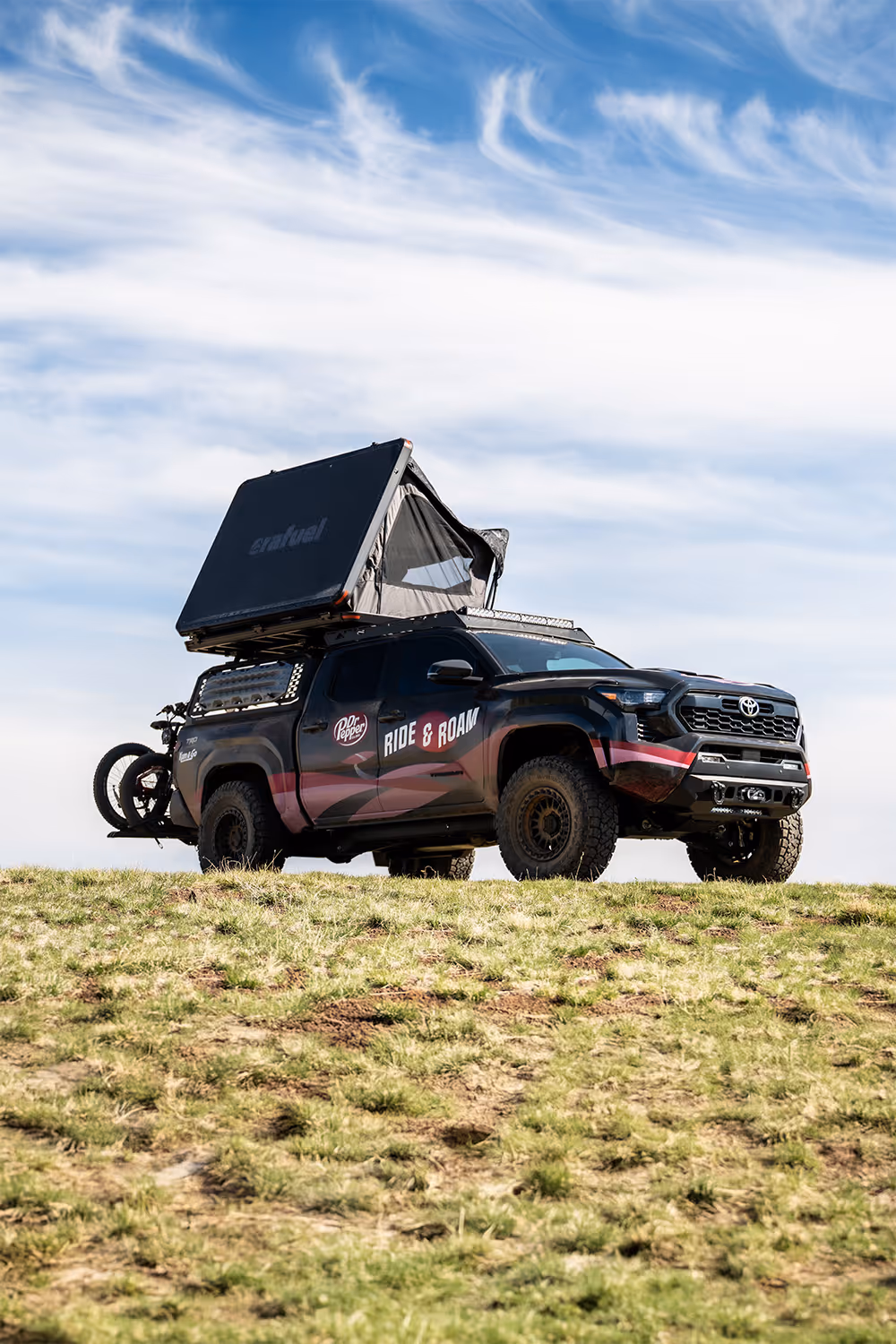 2024 Toyota Tacoma with two off road e-bikes, a pop-up tent and $5,000 cash